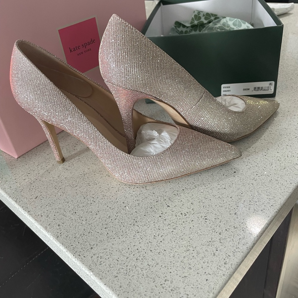 Shiny pink high heel shoes